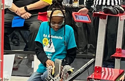 Student at robotics competition